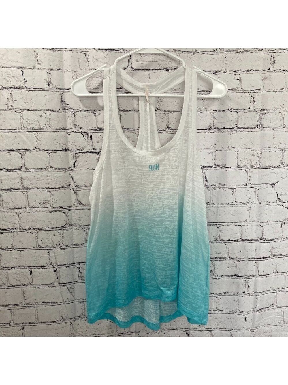 Ladies Ideology racer back tank Size M